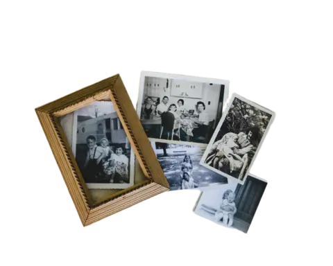 Collection of vintage family photographs being digitally preserved